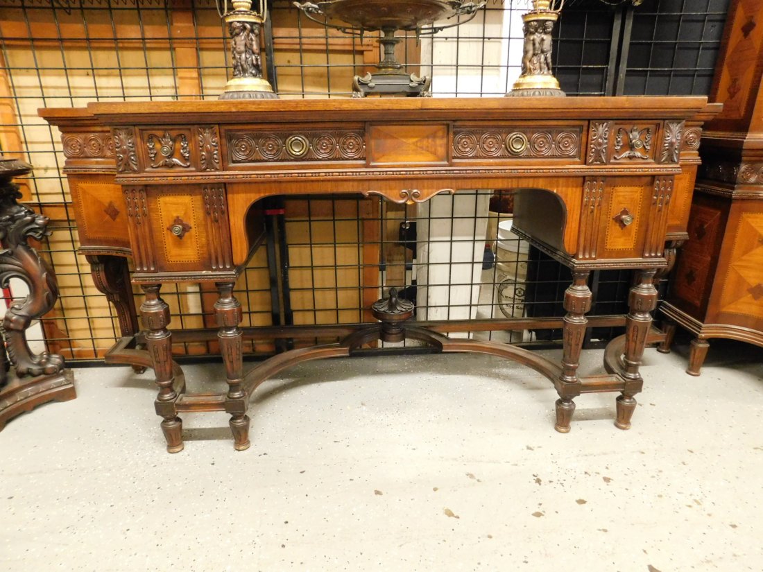 Jacobean Style Sideboard: Jacobean Style Sideboard, mahogany with parquetry panels, diamond band inlays, applied cartouches and rosette and floral carvings; two short and one long drawer and two paneled small doors, turned leg