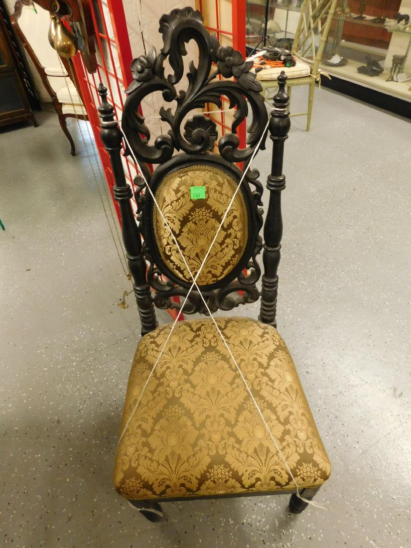 Rococo Revival Slipper Chair: Rococo Revival Slipper Chair, walnut, features open work floral and scroll carved crest and back with gold brocade cameo back panel and seat, turned stiles and legs, c 1850-60, 44 3/4"h. CONDITION: Ve