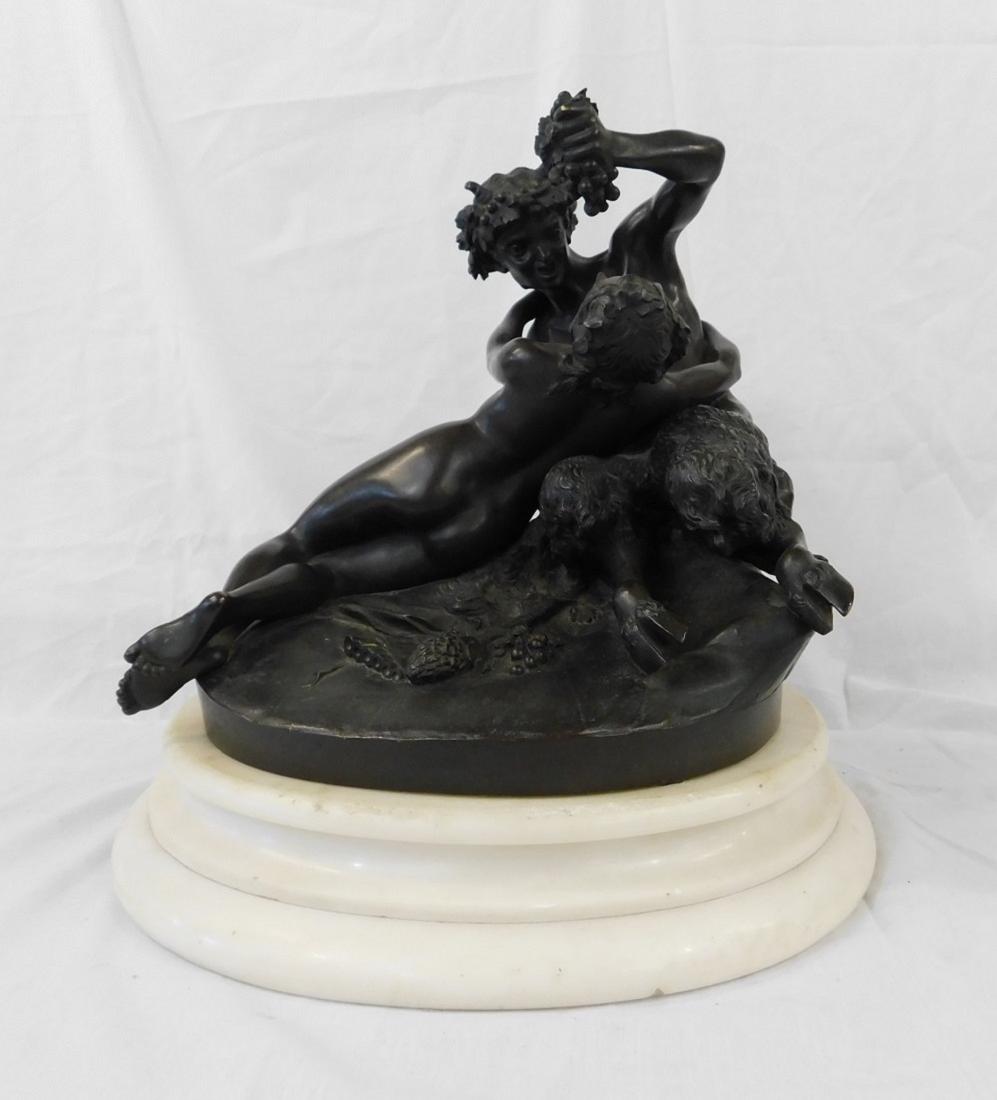19th C Bronze - Satyr & Nymph: 19th C Bronze - Satyr and Nymph, patinated cast bronze depicting a seated Satyr feeding grapes to a reclining female nude, unsigned, molded white marble base, bronze 10 1/4"h, 11"l, 10"w on marble bas