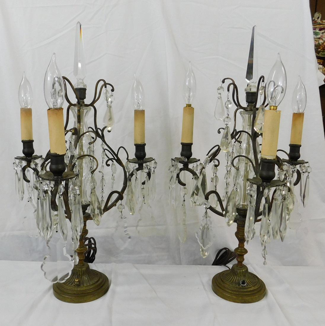 Pair Classical 3 Lite Candelabra: Pair Classical three Lite Candelabra, brass in modified lyre form on cast circular base, features, crystal columns with spear crests and a variety of cut crystal pendant prisms, early to mid 20th C, 2