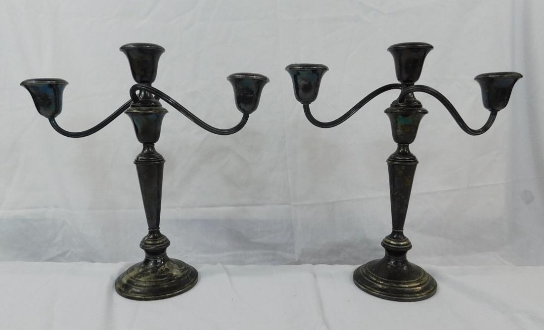 Pr Sterling Silver Candelabra: Pair Sterling Silver Candelabra, Gorham, weighted sterling, in four sections; 2 1/2" low base stick, 4 1/4" column, 2 1/2" candle holder and a 10 1/2" x 3" three light candelabra, over all height 11 1