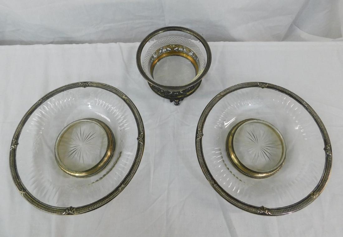 3 Pc French Silver & Crystal Table Accessories: 3 Pc French Silver & Crystal Table Accessories includes: Paul Canaux and Cie hallmarked silver bird, rosette and scroll reticulated stand with saw tooth cut crystal inset bowl, 8.069 ozts, 5 3/4"d