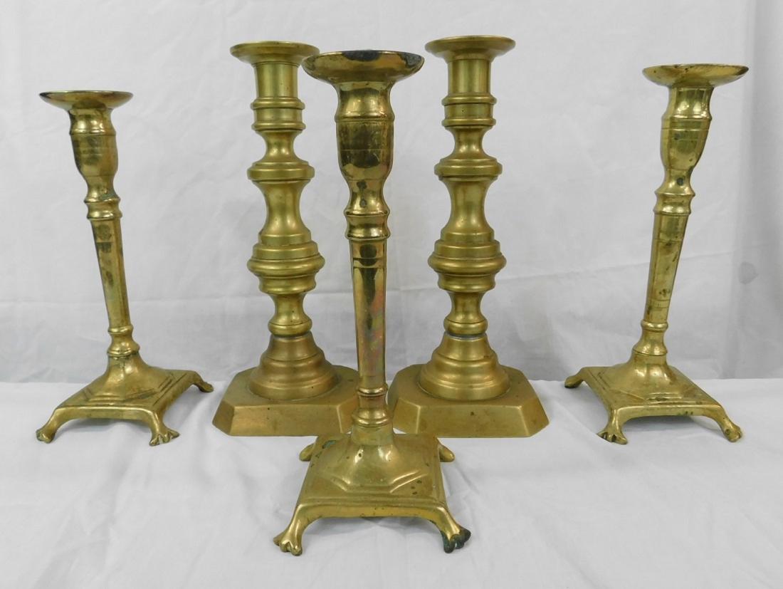 Five Antique Brass Candlesticks: Five Antique Brass Candlesticks, ring and urn turned columns on octagon bases, push up mechanism, 18th / 19th C, 11". CONDITION: Tarnished.