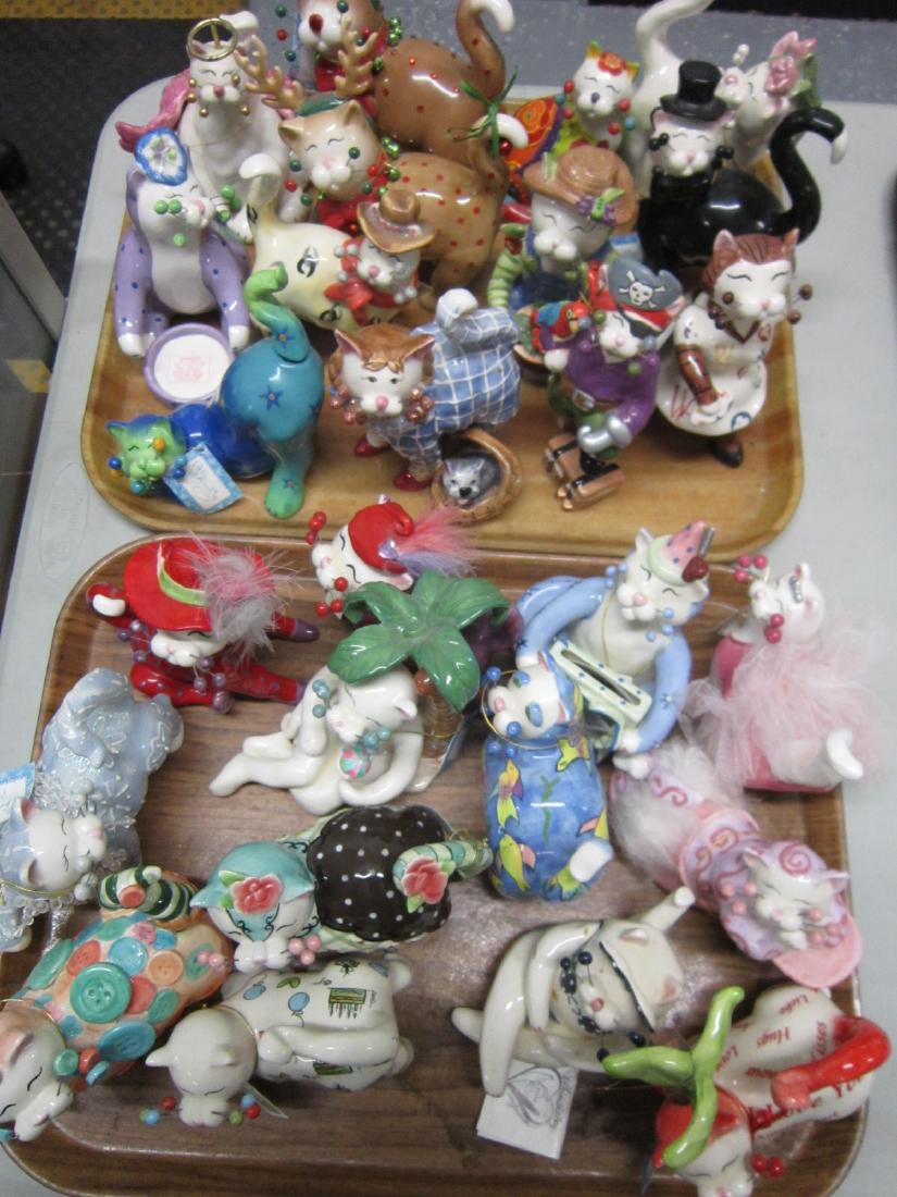 26 Porcelain WhimsiClay Cat Figurines: 26 Porcelain WhimsiClay Cat Figurines, by Amy Lacombe, all with paper tags, some signed, hand painted with applied accent decoration, 4" - 6" Condition: a few might have some minor crazing and a few m