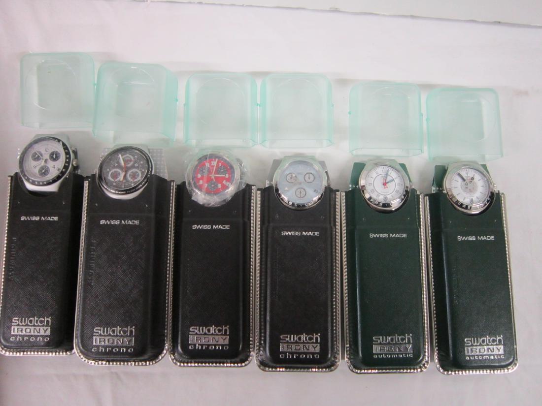 6 Swatch Watches Irony In Original Cases: 6 Swatch Watches Irony In Original Cases, new old stock with color cardboard and hard plastic top cases and folded information sheets including: four "Chrono" (black cardboard), Adrenaline Restyled, Y