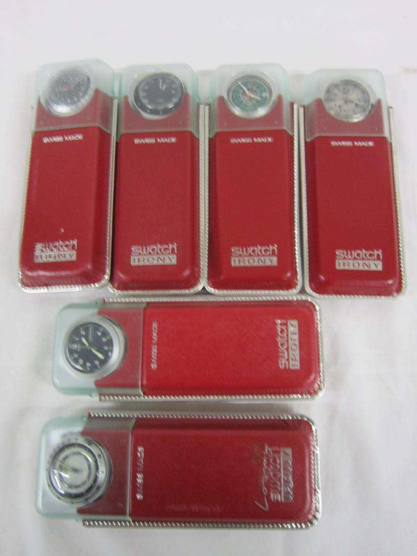6 Swatch Watches in Original Cases: Six Swatch Watches in Original Cases, Irony, new old stock, in red cardboard and plastic top cases with folded information sheet including: Backward, YGS 401, 1994; Frelon,YGS 900, 1998; Space Rider,