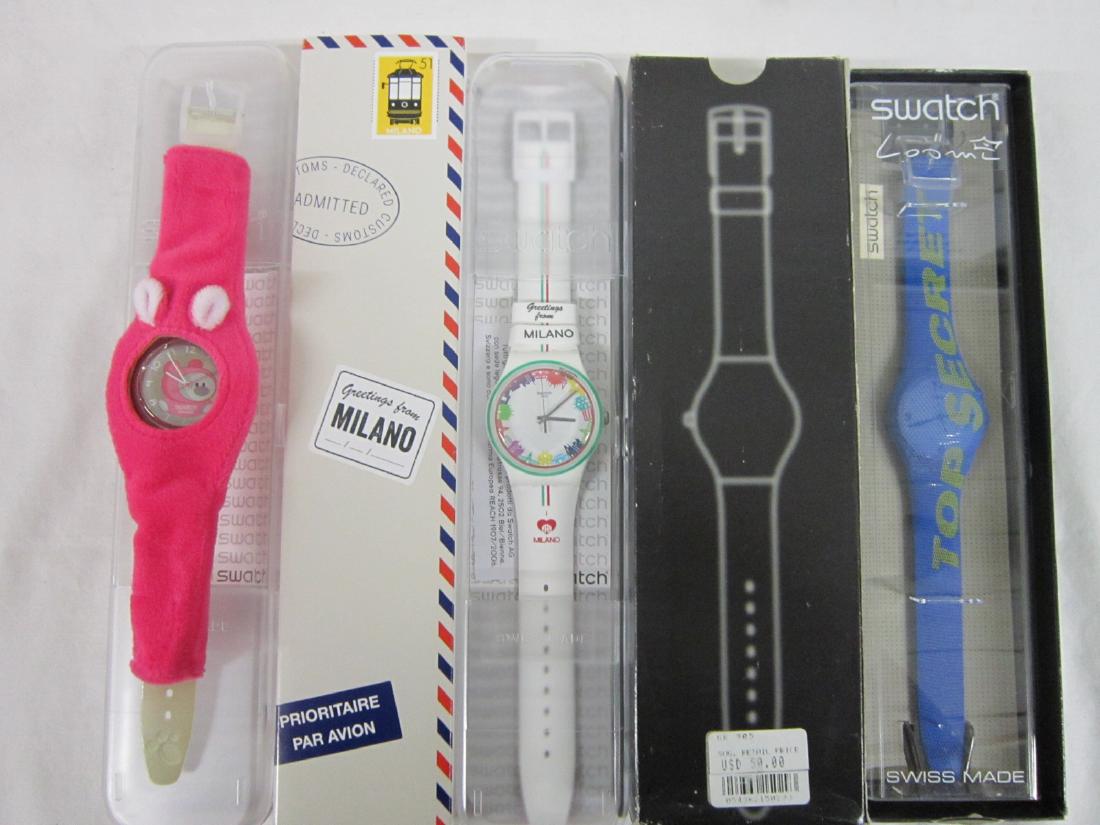 3 Swatch Watches In Original Cases: 3 Swatch Watches in Original Cases, new old stock, Top Secret, GK 905, in hard plastic case, folded information sheets including: Top Secret GK 905 and outer cardboard box with sliding inner cardboard