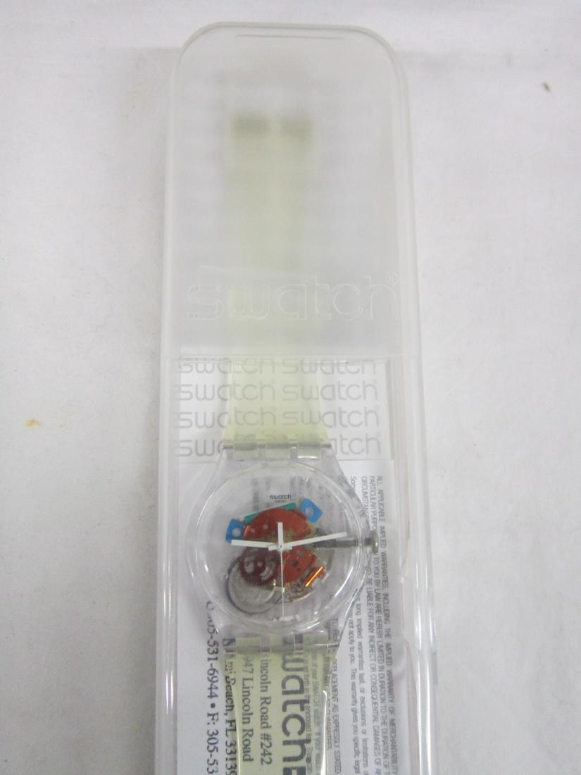 Swatch Watch In Original Case: Swatch Watch In Original Case, new old stock, Random Ghost, Soukill, in hard plastic case with folded information sheet. Note: We Do Not Guarantee Working Condition of any watch. CONDITION: Original b