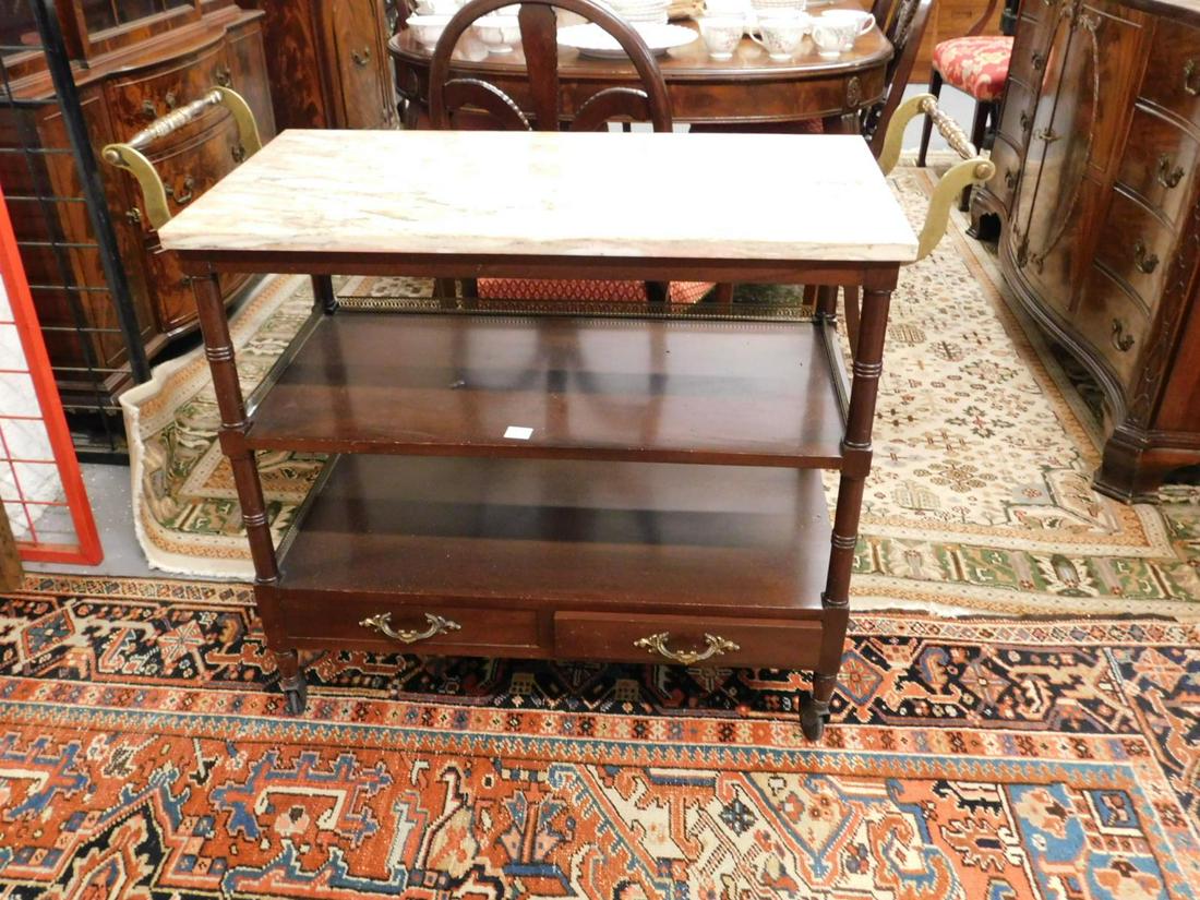 Regency Styel Tea Cart: Regency Style Tea Cart, veined rouge to white marble top, mahogany ring turned columns, brass end handles and gallery, two base drawers, casters, mid 20th C, 39" x 17 1/4" x 33 3/4". CONDITION: Very g