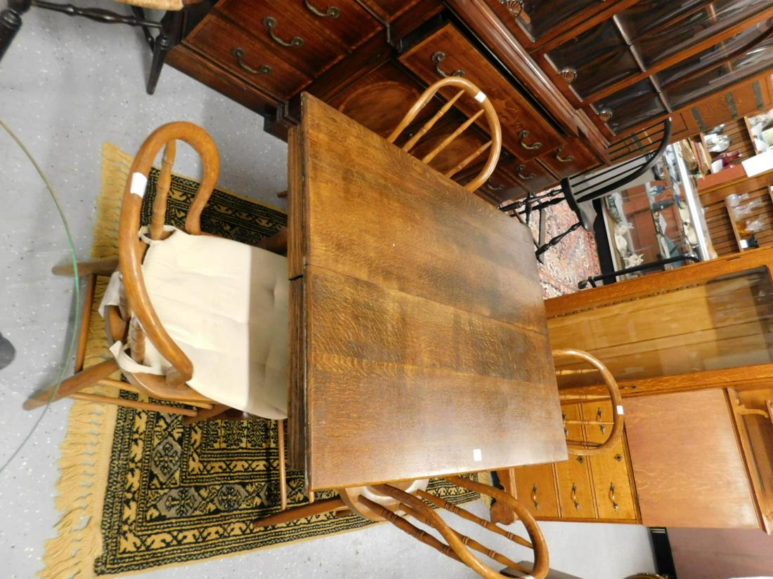 Antique Table and 4 Chairs: Antique table and 4 chairs, golden oak extension table on 5 turned legs with high arched and incised stretchers and 6 leaves, 32" x 42", plus 4 balloon back four spindle plank seat chairs, 33" h. circ