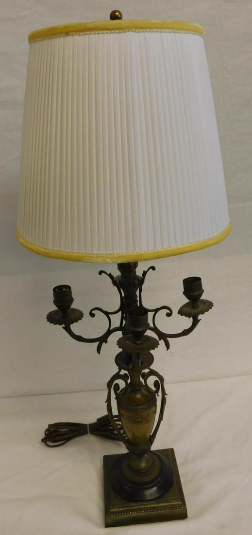 Victorian Renaissance Revival Candelabra: Victorian Renaissance Revival Candelabra, brass urn form with rosette and scroll castings and two long fancy cast side handles; four shaped arm candelabrum; circular base upon a later added square bas