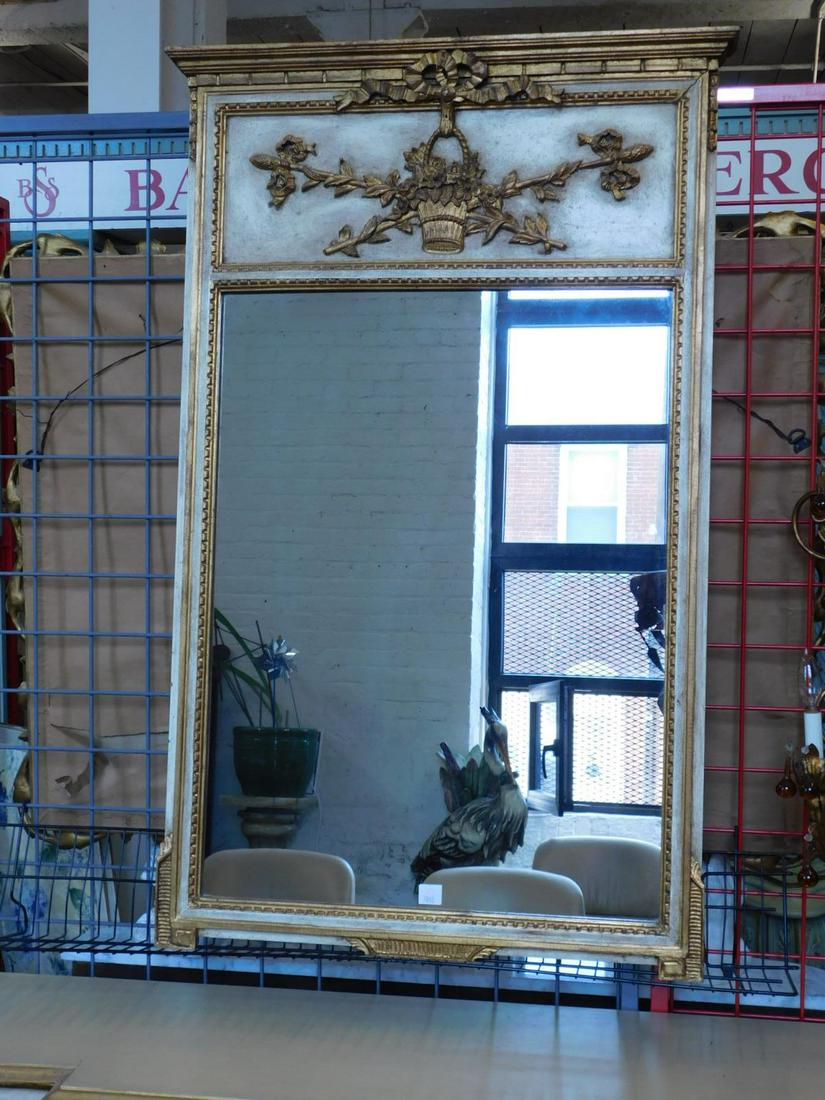 Neoclassical Wall Mirror: Neo Classical wall mirror, antiqued white finished hardwood with gilt boarders, carved and applied gilt ribbons and floral basket, 30" x 50", mid 20th c. Condition; very good, minor wear