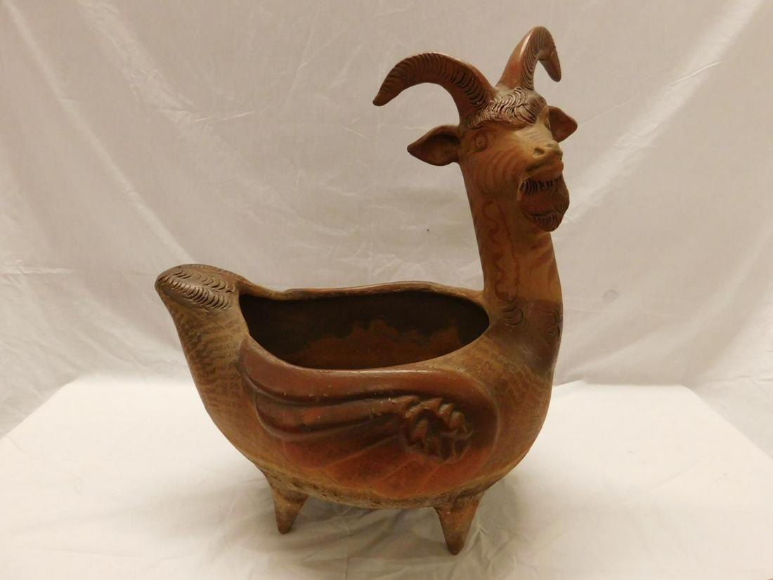 Mexican Pottery Winged Goat Jardiniere: Mexican Pottery Winged Goat Jardiniere. A very large vintage Mexican redware planter in the form of mythical creature with a goat's head and bird's body. Partially glazed, mid 20th c. Size: 19" x 23.5