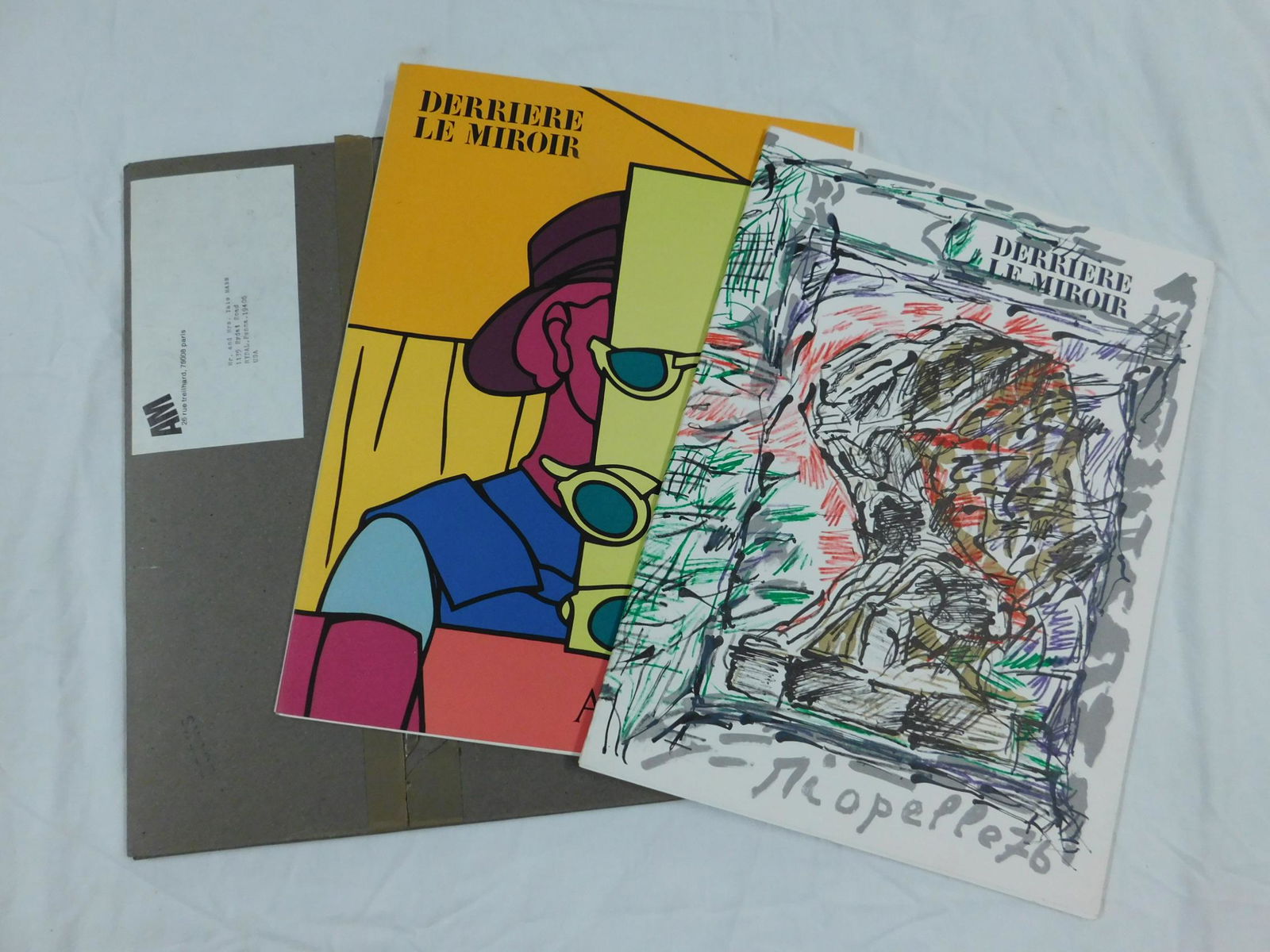 Deriere le Miroir - Three Issues: [3 items] Three issues of Derriere le Mirroir: # 218 (Jean-Paul Riopelle, #220 (Valerio Adami) and #224 (Saul Steinberg. All loose folios as issues; the Steinberg issue in original shipping sleeve.