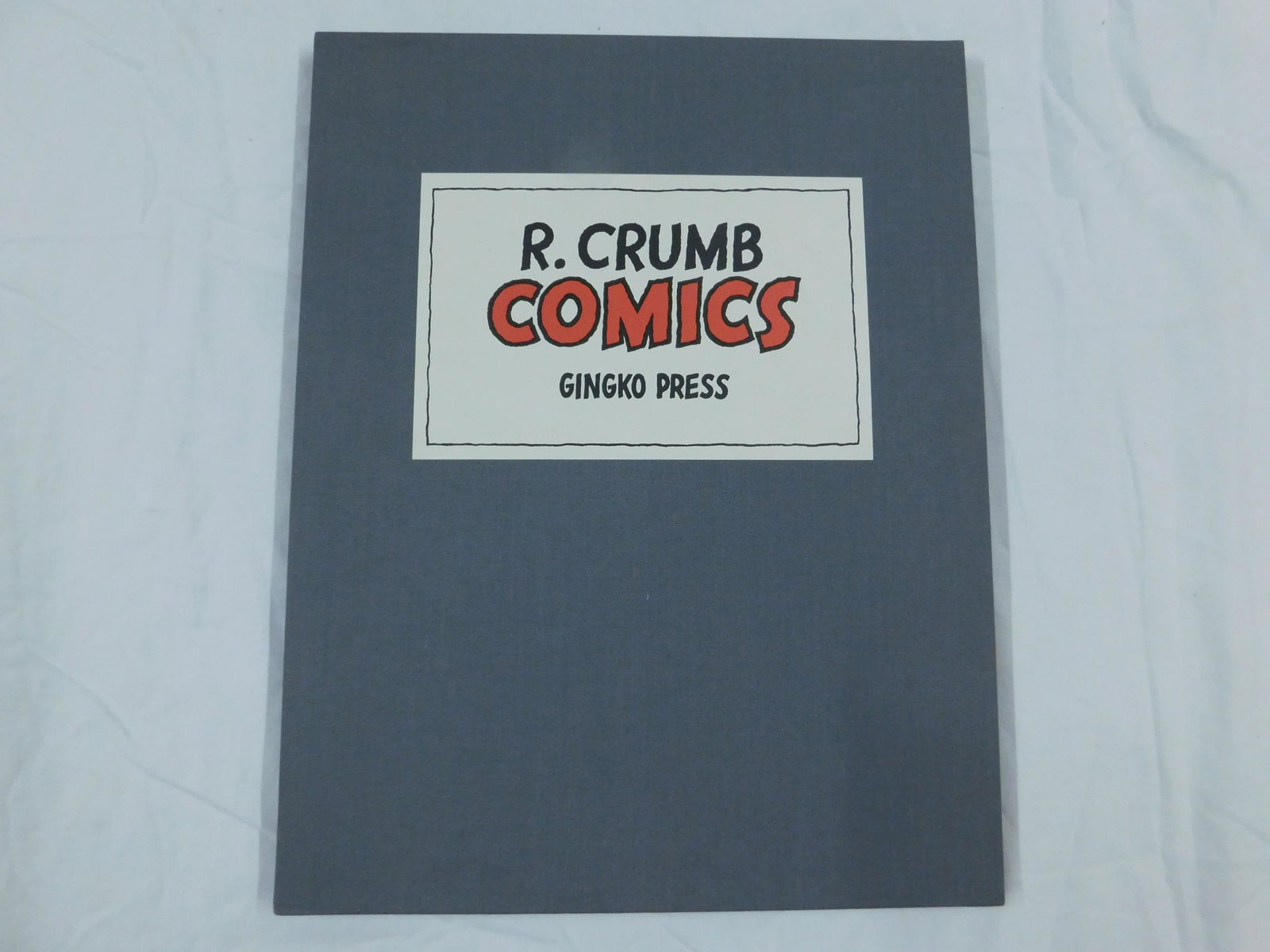 Crumb R Comics Gingko Press Sgd Ltd Ed: Crumb, Robert, Comics, Gingko Press, Hamburg, 1992. #72 of a signed, limited edition of 500 copies. Bound in grey cloth in a grey cloth-covered publisher's slipcase. Contains "The Story O' My Life", "