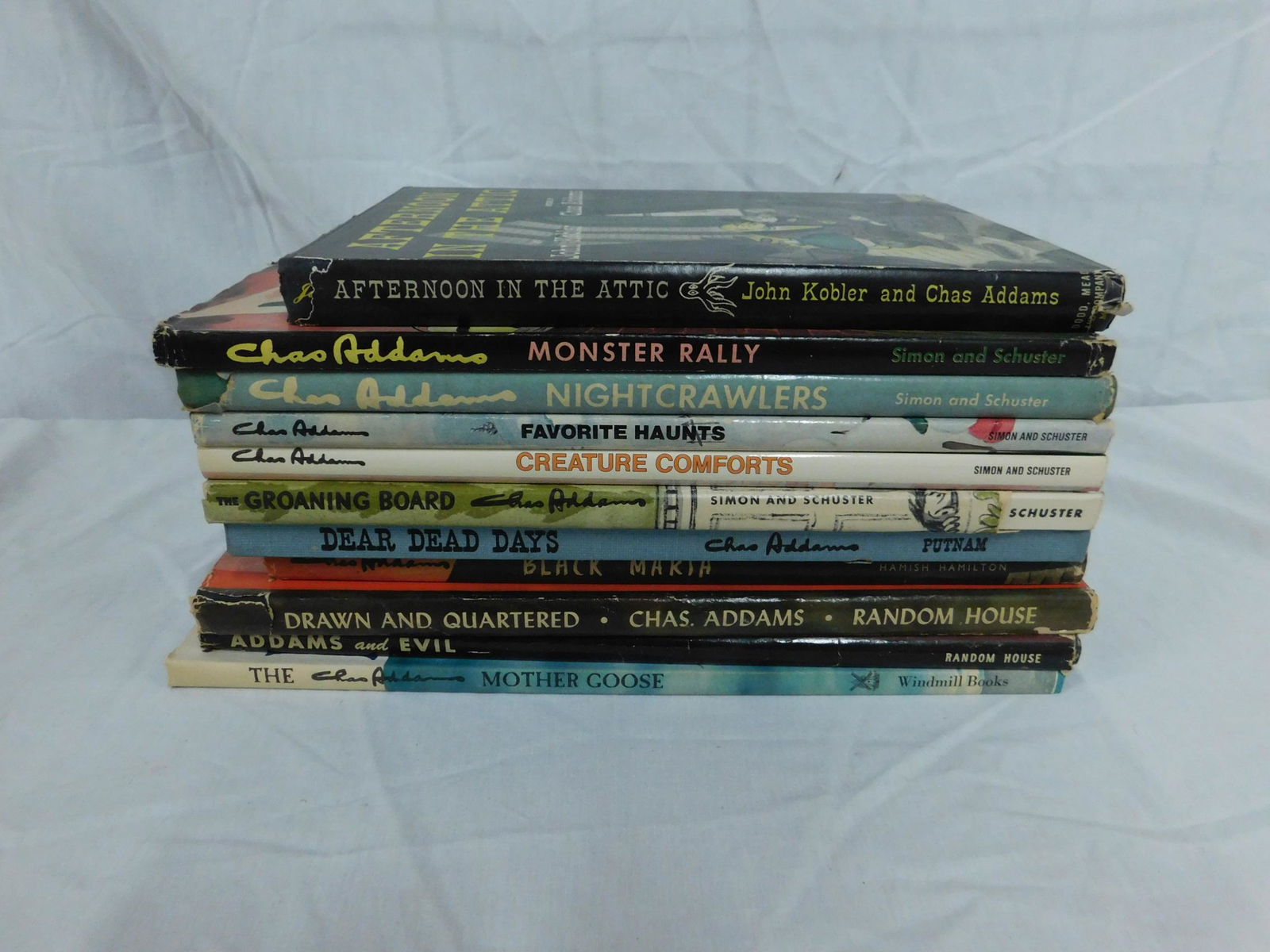Charles Addams Book Lot: [11 items] Addams, Charles books: Drawn & Quartered, Random House, New York, 1942; Addams & Evil, Random House, New York, 1947 (first printing); Afternoon in the Attic, Dodd Mead & Co, New York, 1949;