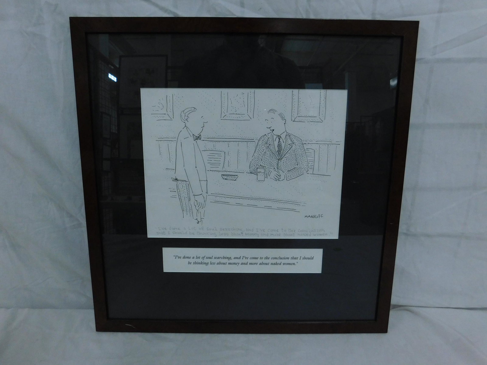 Robert Mankoff Original Catroon Art: An original, framed drawing by Robert "Bob" Mankoff (American, born 1944) for a cartoon published in the 7 October 2002 issue of the New Yorker Magazine. The image shows a man sitting at a bar, talkin