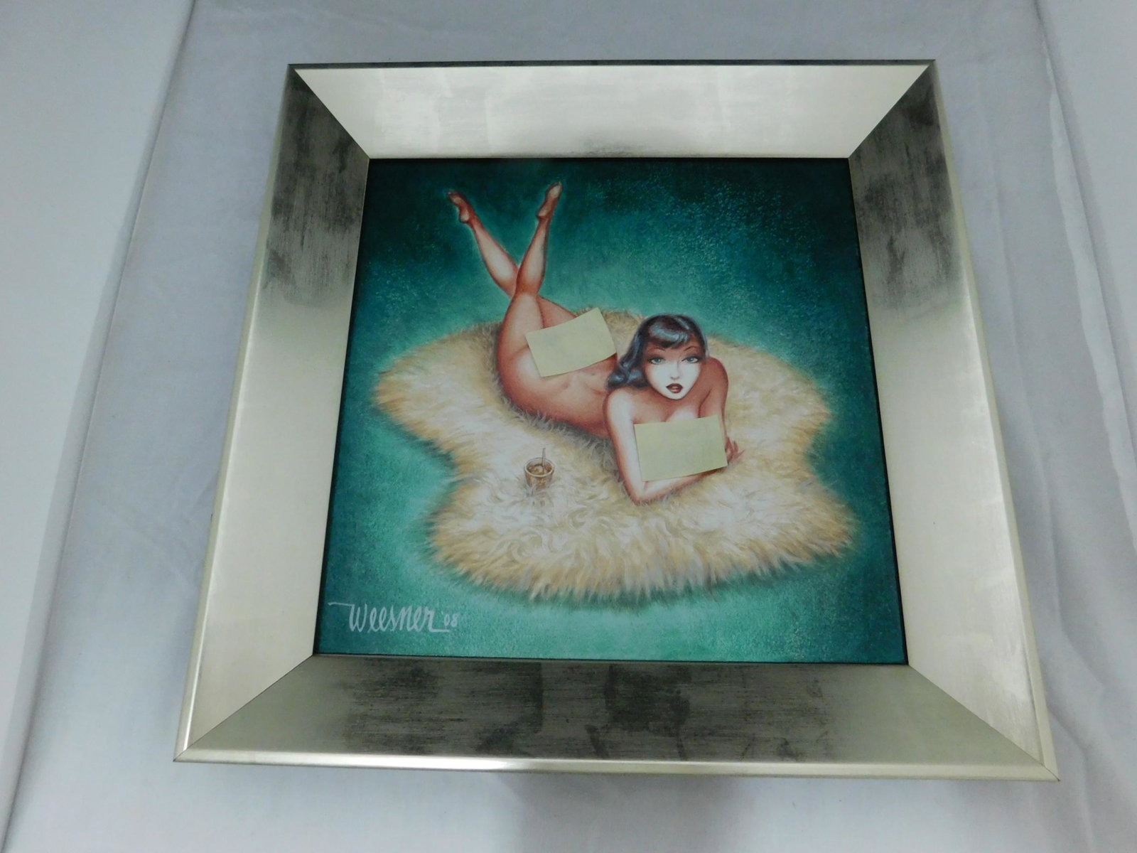 Keith Weesner "Turquoise" Acrylic on Board: A framed original acrylic on board by retro/vintage pinup artist Keith Weesner, titled "Turqiouse", showing a dark-haired, nude woman reclining on a bearskin rug. Its' signed and dated 2008 in the low