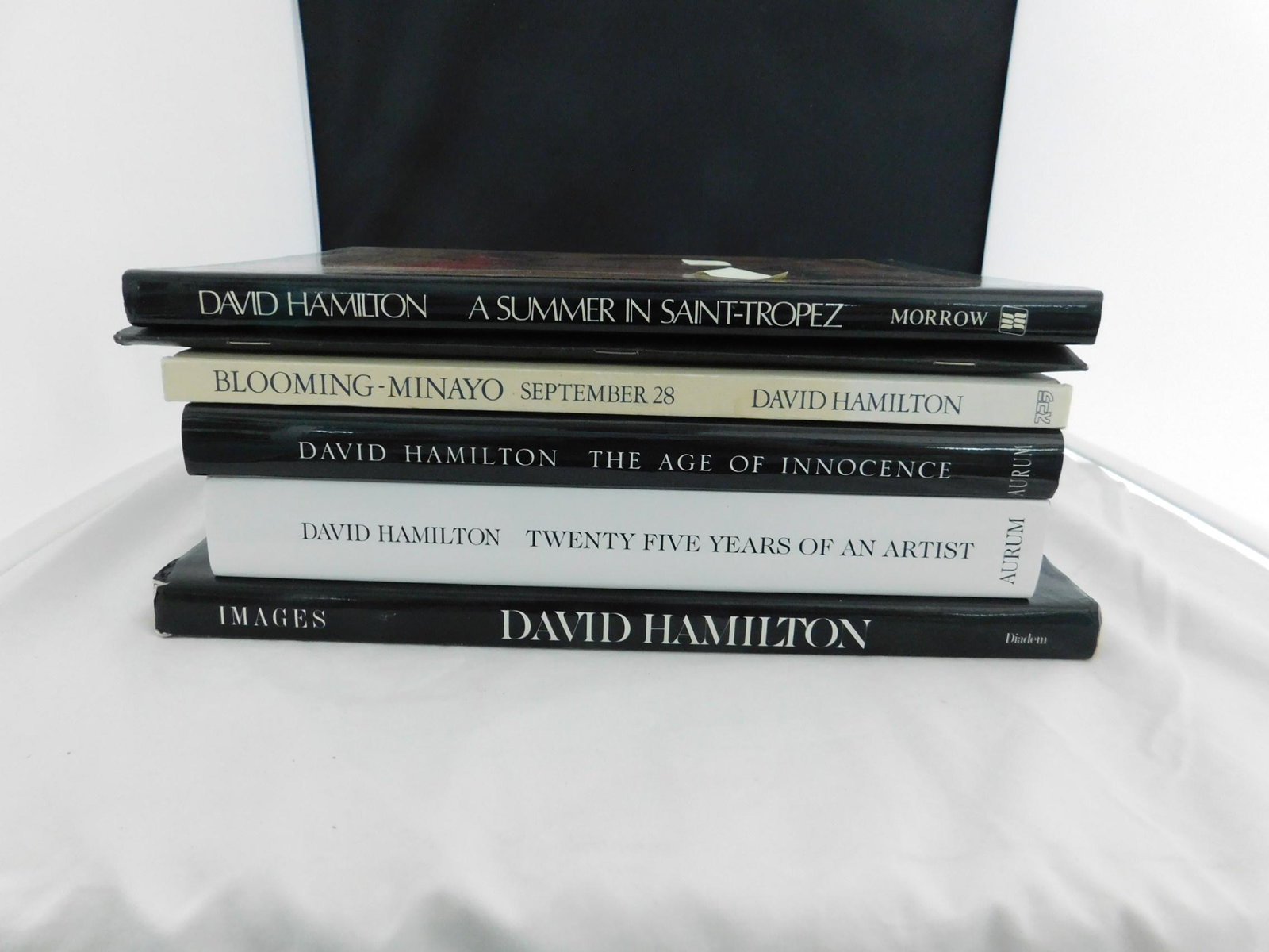 David Hamilton Photography Books (Lot 2): [5 items] Hamilton, David, A Summer in Saint-Tropez, William Morrow, New York, 1982 (stated first edition); Images,Diadem, New York, 1984; Blloming-Minayo September 28, Eichi Publishing, Tokyo, 1992; 