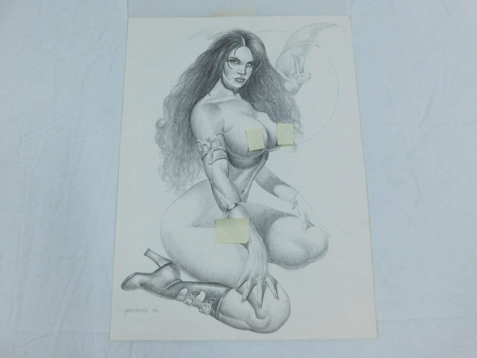 Daniel Pascarelli Fantasy/Erotic Drawing: A graphite drawing on paper by fantasy artist Daniel Pascarelli of a nude woman in boots with a bat taking flight behind her. On the reverse of the sheet, there is a pencil sketch for what looks like