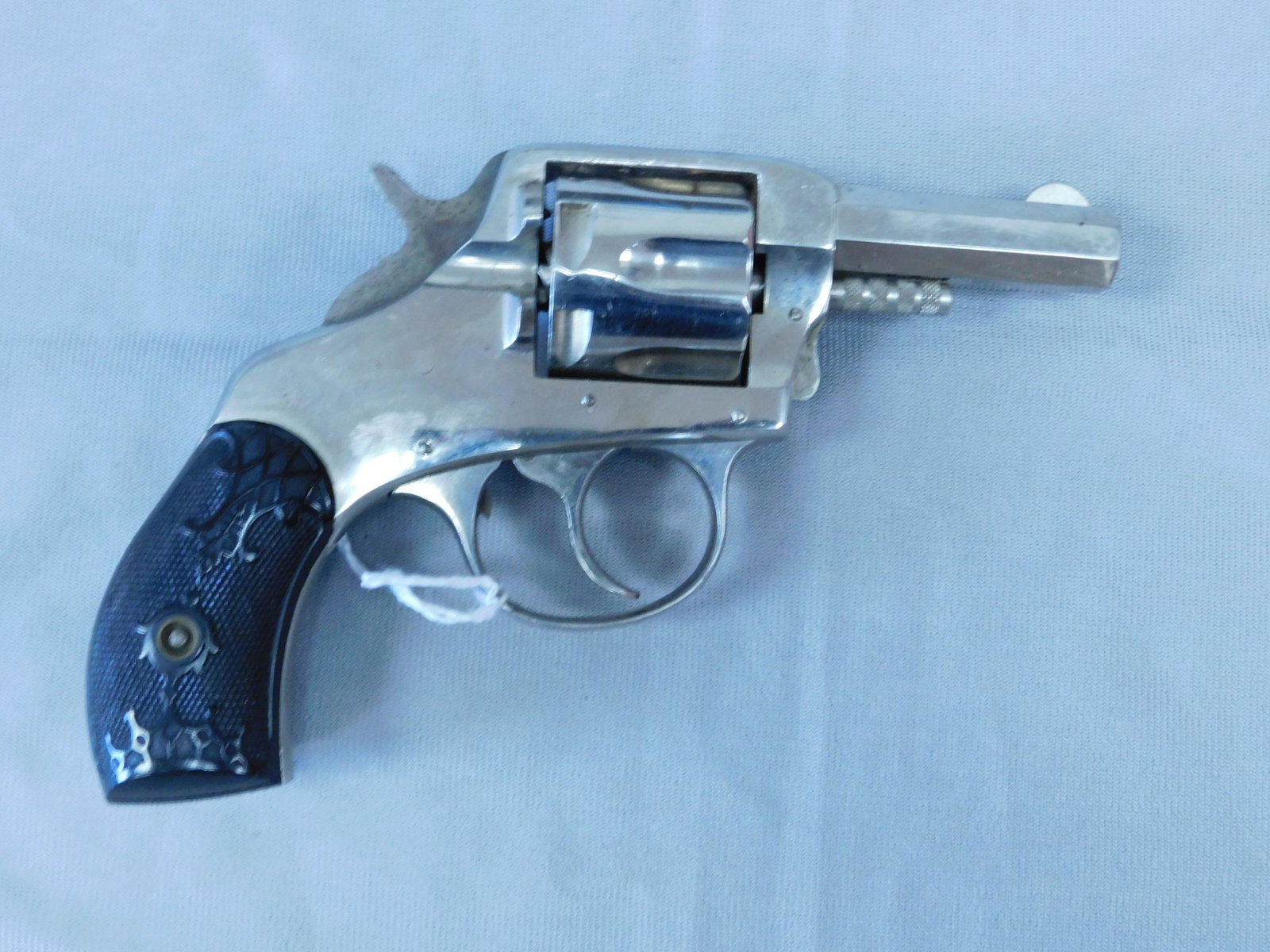 American Chromed Revolver: American Chromed Revolver, Harrington & Richardson, 6 shot double action, black bakelite grips, 1 3/4" barrel, 32 S & W caliber, overall length 6 3/4", circa 19th / 20th, no serial numbers. CONDITION: