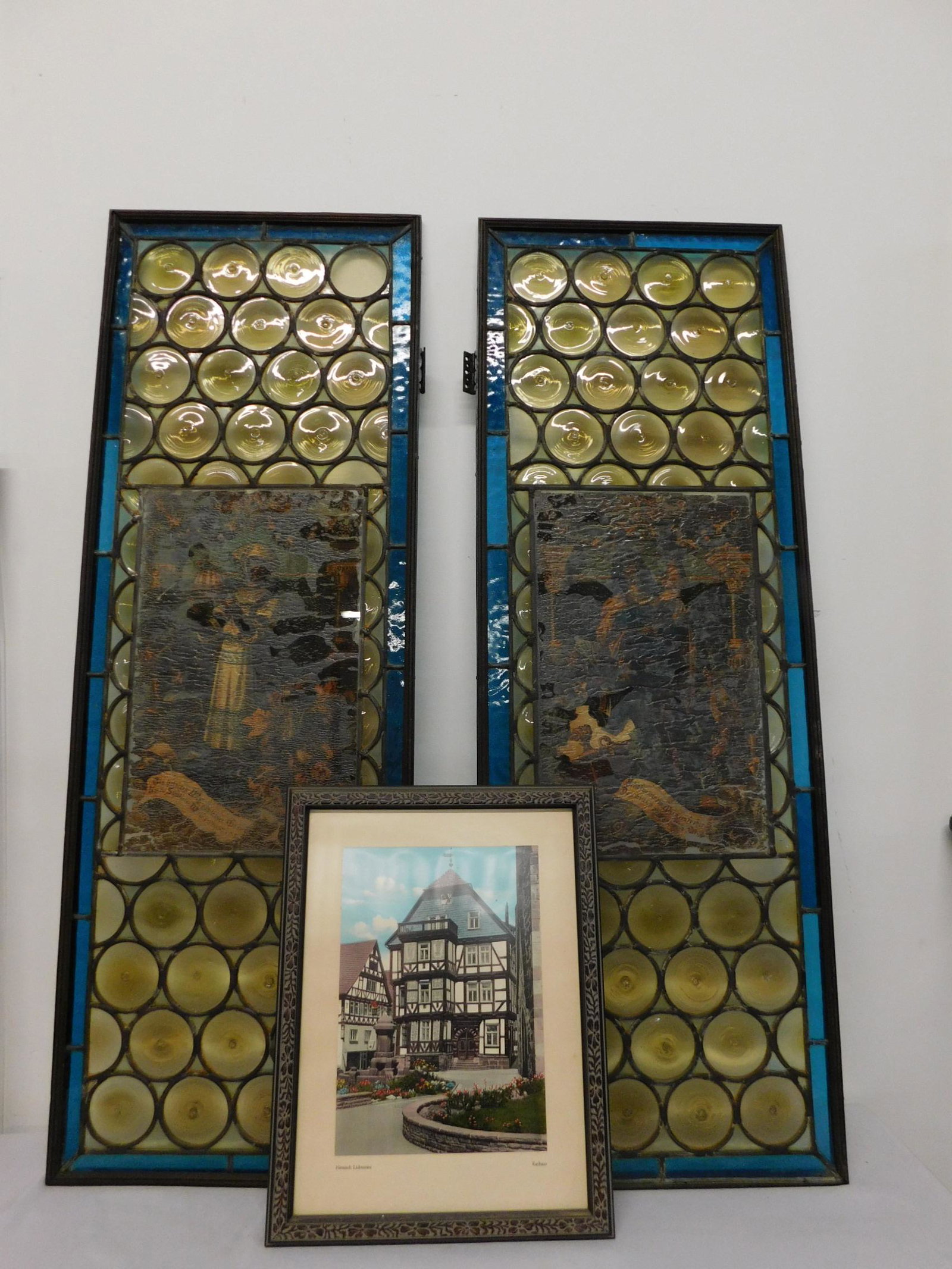 Pr 18th C. Leaded Glass Windows: Pair 18th C. Leaded Glass Windows, from the Rathaus in Hessisch Lichtenau, each with painted panels of peasants in landscape inscriptions, surrounded by leaded hand blown bottle glass panels and blue
