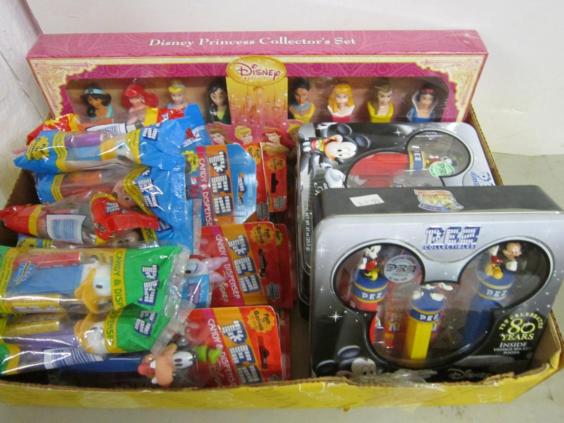 Lot Disney Pez Dispensers New in Packages: Lot Disney Pez Dispensers New in Packages including: three Pez celebrates Mickey 80 years (factory sealed with three Mickey character dispensers, three packs of candy and "Vintage Mickey" poster, ten