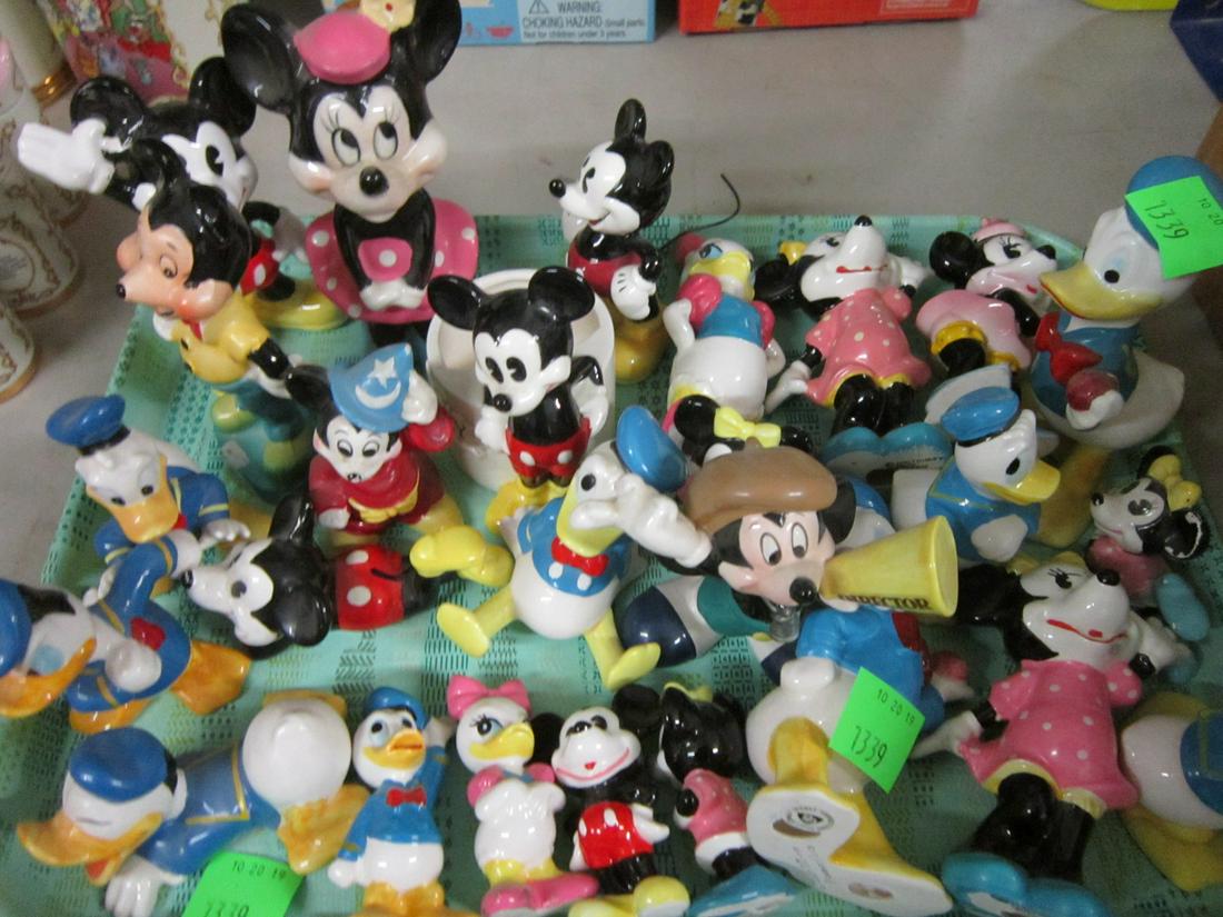 Large Lot Porcelain Disney Figures: Large Lot Porcelain Disney Figures, Walt Disney Production, Japan featuring Mickey and Minnie (some pie-eyed), Donald and others, one with toothbrush holder, 2 1/2", 6", all hand painted. CONDITION: S