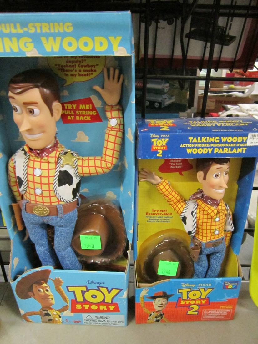 2 Toy Story Talking Woody Dolls: Two Toy Story Talking Woody Dolls, both new in original packages, larger Toy Story, 18", smaller Toy Story 2, 13", both with hat. CONDITION: No issues identified.