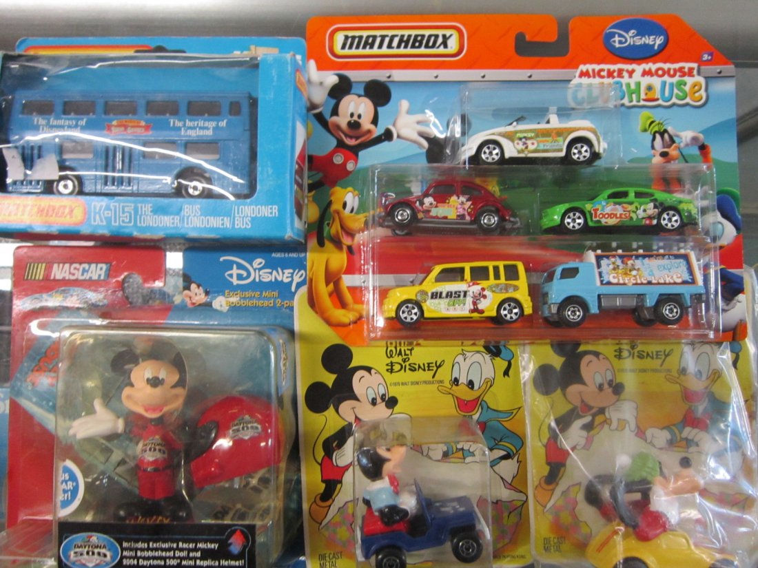 Lot Disney Matchbox and other vehicles: Lot Disney Matchbox and other vehicles, all in original packages including; K-15, The Londoner bus, "The Magic of Alton Tower", set of (5) Mickey Mouse Club and Walt Disney Mickey Mouse car, WD - 5, p