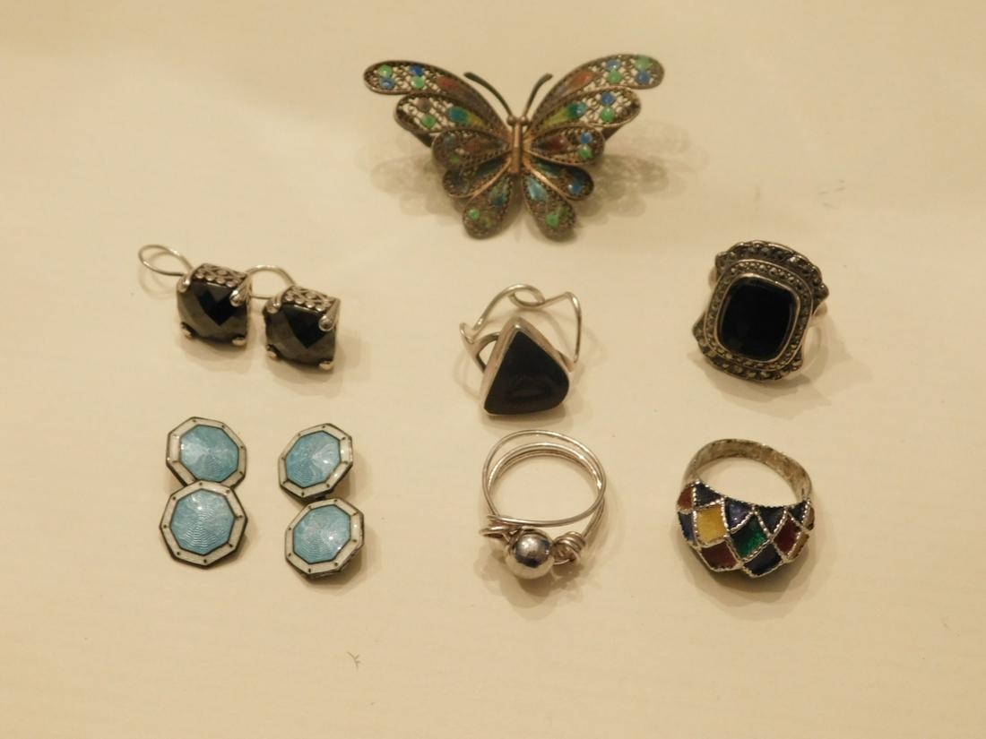 Silver Jewelry Group: Silver Jewelry Group includes: 800 silver filigree and enameled butterfly pin, a pair of sterling and enamel cuff links, pair of unmarked sterling and cut square Hematite pierced earrings; sterling an