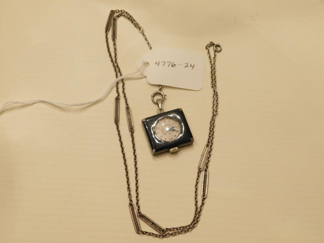 Lady's Deco Silver & Enamel Pendant Watch: Lady's Art Deco Silver Pendant Watch, unmarked silver link and filigree bar 28" chain with a "Hall Watch" with round dial in a rectangular floral enameled case (1" x 3/4"), early 20th C.[24] CONDITION