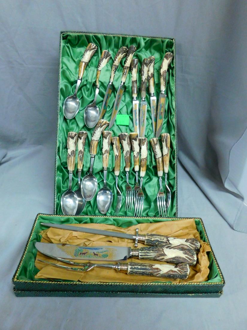 German Carved Stag Handle Flatware Set: German Carved Stag Handle Flatware Set, service for six, each with a high relief carved deer on the stag handles, all with stainless steel Solingen blades that are etched and enameled with deer in a p