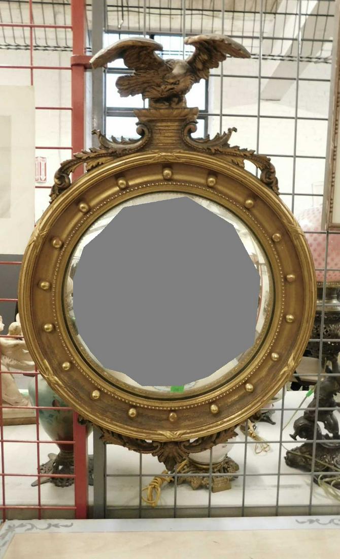 Classical Convex Wall Mirror: Classical Convex Wall Mirror, gilt and gessoed wood, deep round molded frame with bead and ball borders; crested by a carved spread wing eagle on plinth flanked by acanthus scrolls, early 20th C, 26"