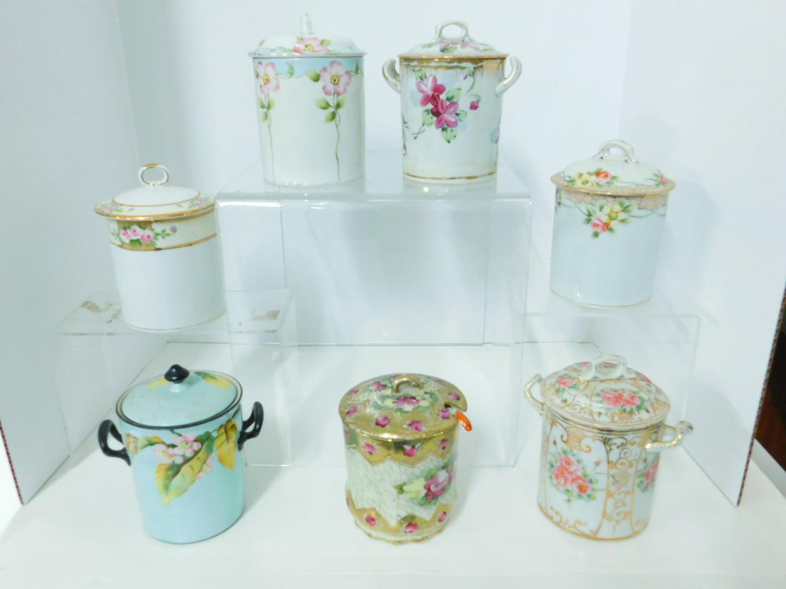 7 Oriental Canned Milk Containers: Seven Oriental Canned Milk Containers, porcelain, four Nippon, one Noritake, two unmarked; NO UNDER PLATES, 19th / 20th C. CONDITION: Very good, one Nippon Azalea with hairline crack in lid.