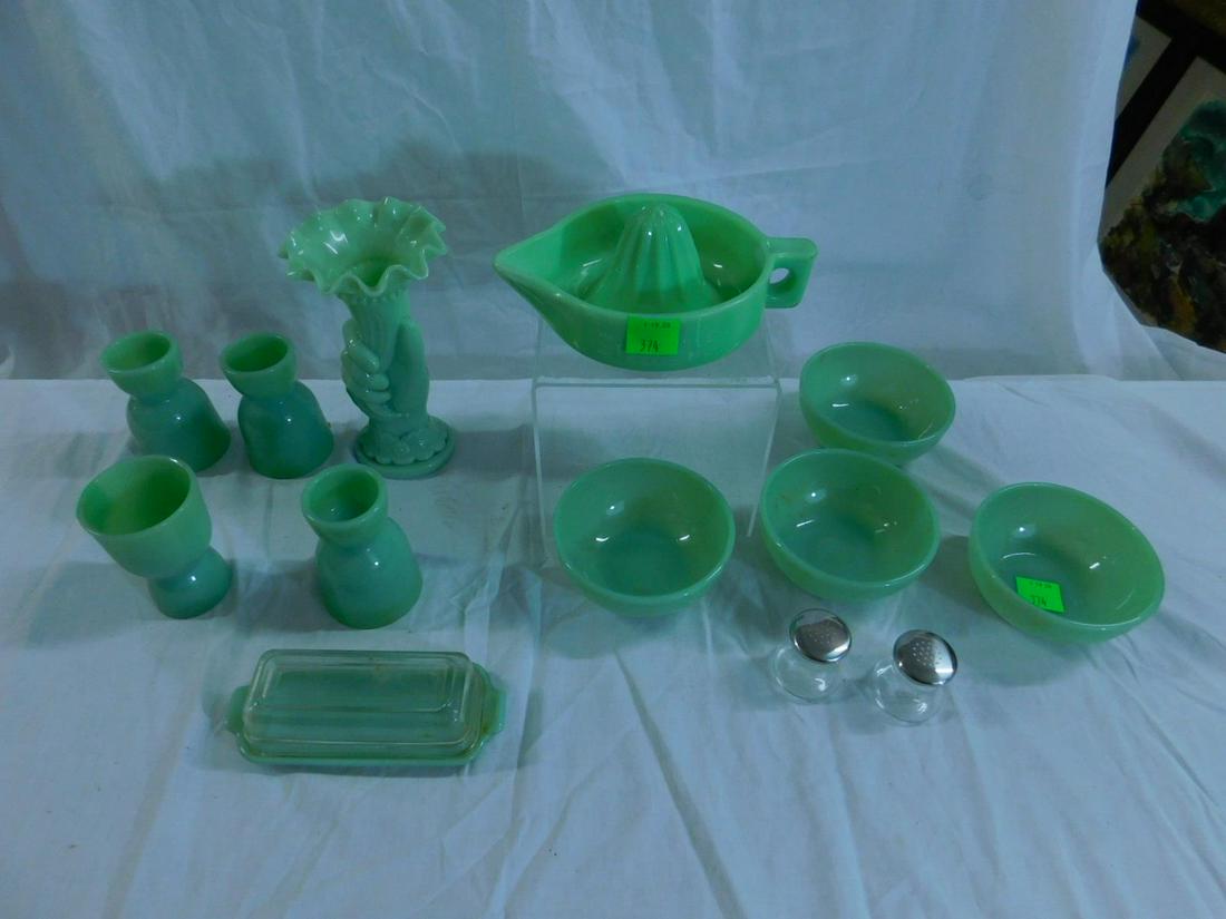 Lot Jadeite Glass Kitchenware: Lot Jadeite Kitchenware, consisting of four cereal or chili bowls, four double egg cups, a jadeite and crystal butter dish, a Sunkist reamer, a hand vase (likely Westmoreland) and a set of crystal and