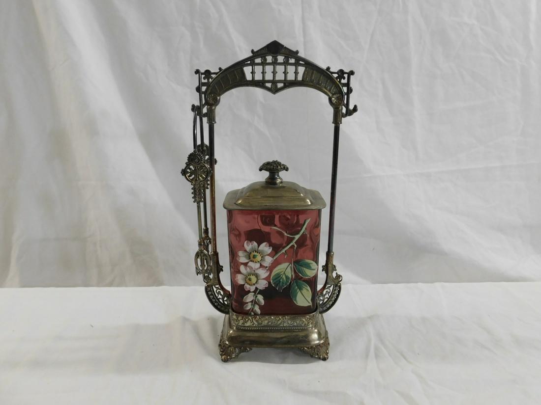 Victorian Pickle Caster: Victorian Pickle Caster, unique rectangular, cranberry glass inverted thumbprint caster with enameled dogwood flowers, rests in a conforming Webster quadruple plate stand with arched spindle crest, pl