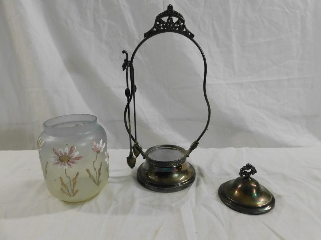 Victorian Pickle Caster: Victorian Pickle Caster, Aqua iridescent finish glass caster with enameled flowers on stems, rests in a Great Eastern quadruple plate bowed stand with tongs, circa 1880-1895, 10 3/4"h. CONDITION: Very