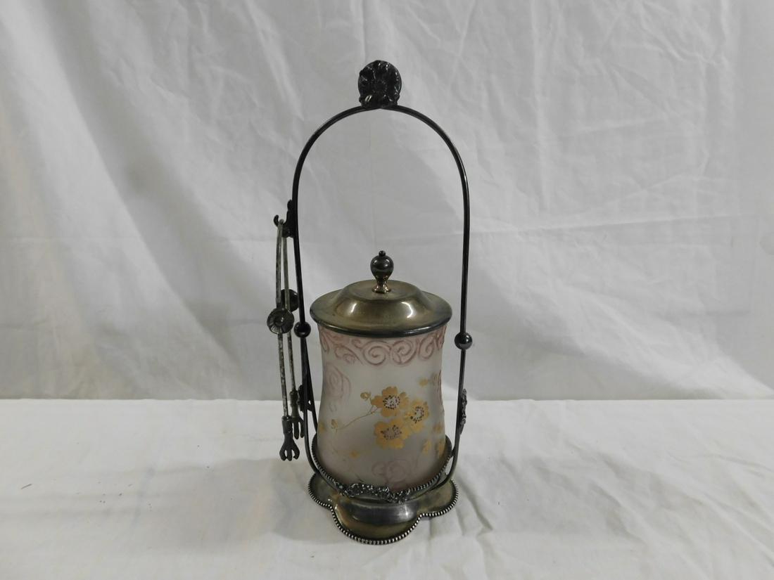 Victorian Pickle Caster: Victorian Pickle Caster, scroll molded frosted glass caster with painted gilt flowers, rests in a Pairpoint quadruple plate stand with rosette crest and one matching pickle tongs; circa 1880 - 1900, 1