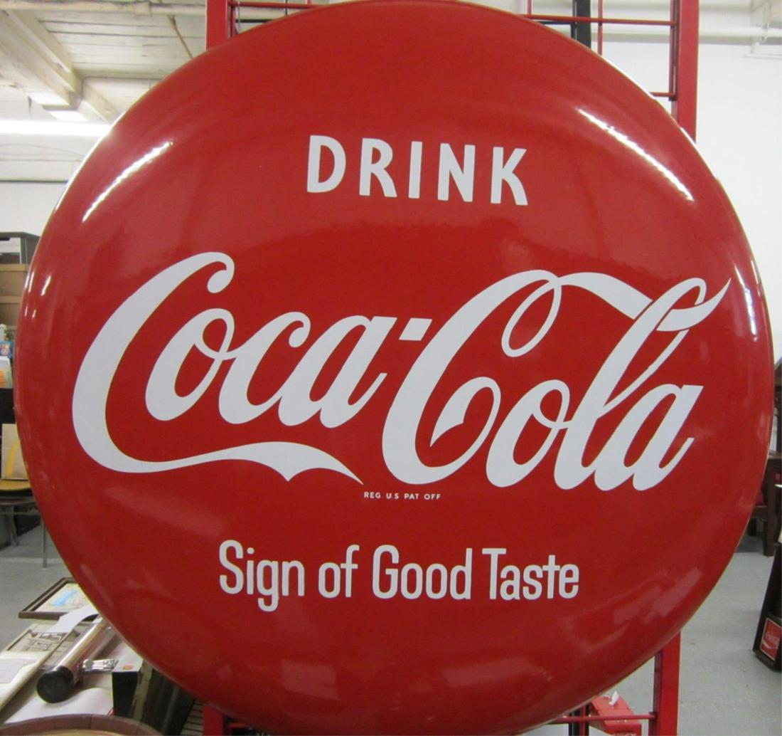 "Drink Coca-Cola" Enameled Convex Sign: "Drink Coca-Cola" Enameled Convex Sign, "Sign of Good Taste", mid to late 20th C, 34"d. CONDITION: Very good, very minor rubs on bottom left, some wear at mounting holes.
