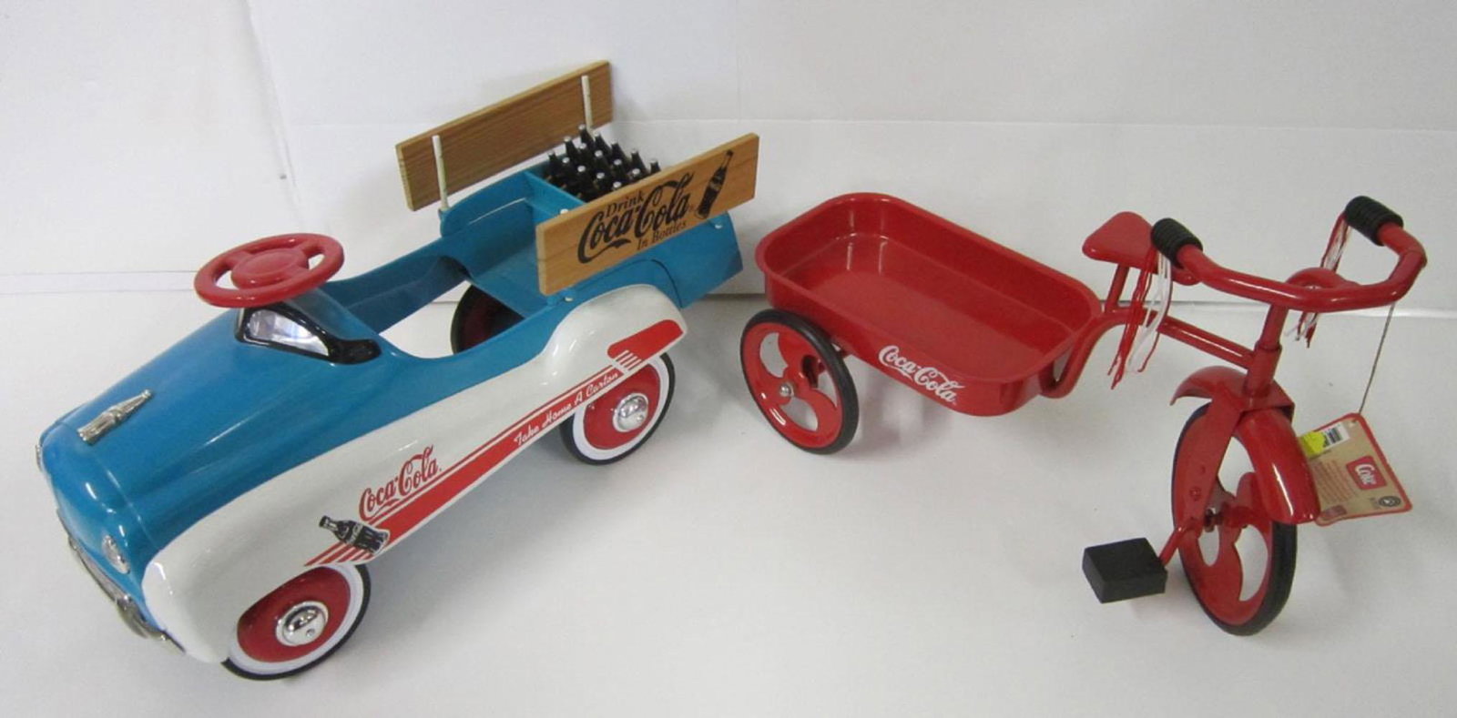 Coca Cola Miniature Pedal Car & 3 Wheel Bike: Coca Cola Die Cast miniature Pedal car and 3 Wheel Bike, including: car with stake bed back , limited edition. No. 0427 of 10,000 (sticker under pedal car), "Coca - Cola - Take Home a Coke', blue and