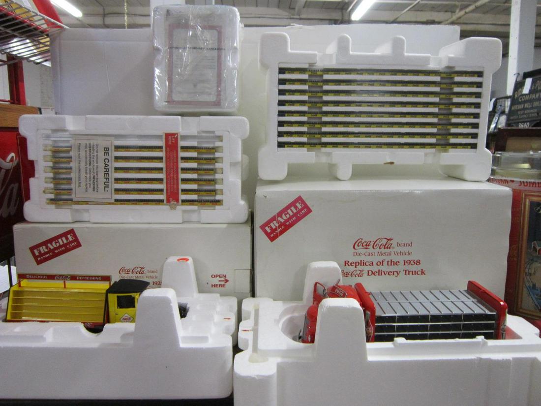 2 Danbury Mint Reproduct Coca-Cola Delivery Truck: Two Danbury Mint Repro Coca-Cola Delivery Trucks, like new in original boxes, with accessories, paperwork and certificate of title for a motor vehicle model including: The 1928 Coca-Cola delivery truc