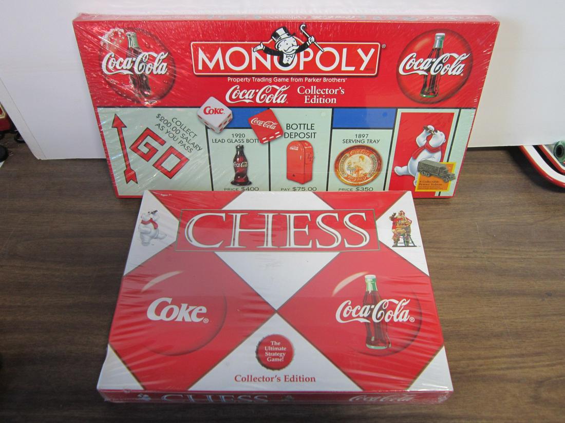 2 Factory Sealed Coca - Cola Board Games: Two Factory Sealed Coca - Cola Board Games including: Chess - The Ultimate Strategy Game, Coke vs Coca-Cola, Collector's Edition, 11" x 14 3/4" x 1 3/4" and Monopoly, Coca-Cola Collector's Edition, 10