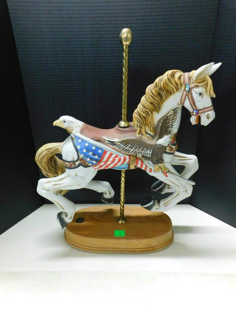 Porcelain Carousel Horse on Wood Base: Porcelain Carousel Horse on Wood Base, hand painted with jeweled harness, eagle head saddle with brass center pole, Limited Edition 123 / 3000, carousel series part 9801, 1 1/8" round metal plaque in