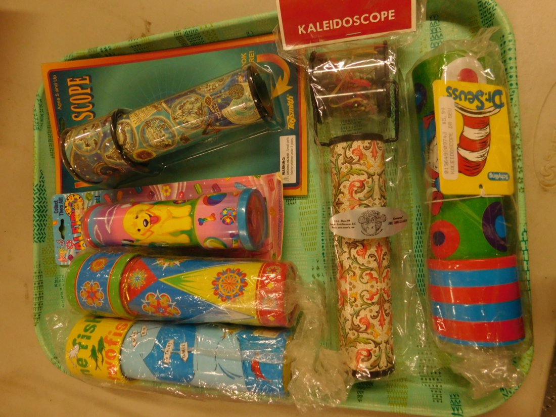 6 Vintage New Kaleidoscopes: 6 vintage new Kaleidoscopes, all in original wrappings with decorated cylinders, 6" to 9".[45] CONDITION: New condition.