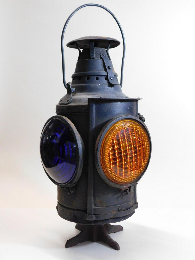 Vintage Railroad 4-Way Switch Lantern #1: Vintage Railroad 4-Way Switch Lantern by Dressel, kerosene, black metal, early 20th c. Orange lenses are plastic replacements . Size: 17" tall. CONDITION: very good used condition, small areas of rust