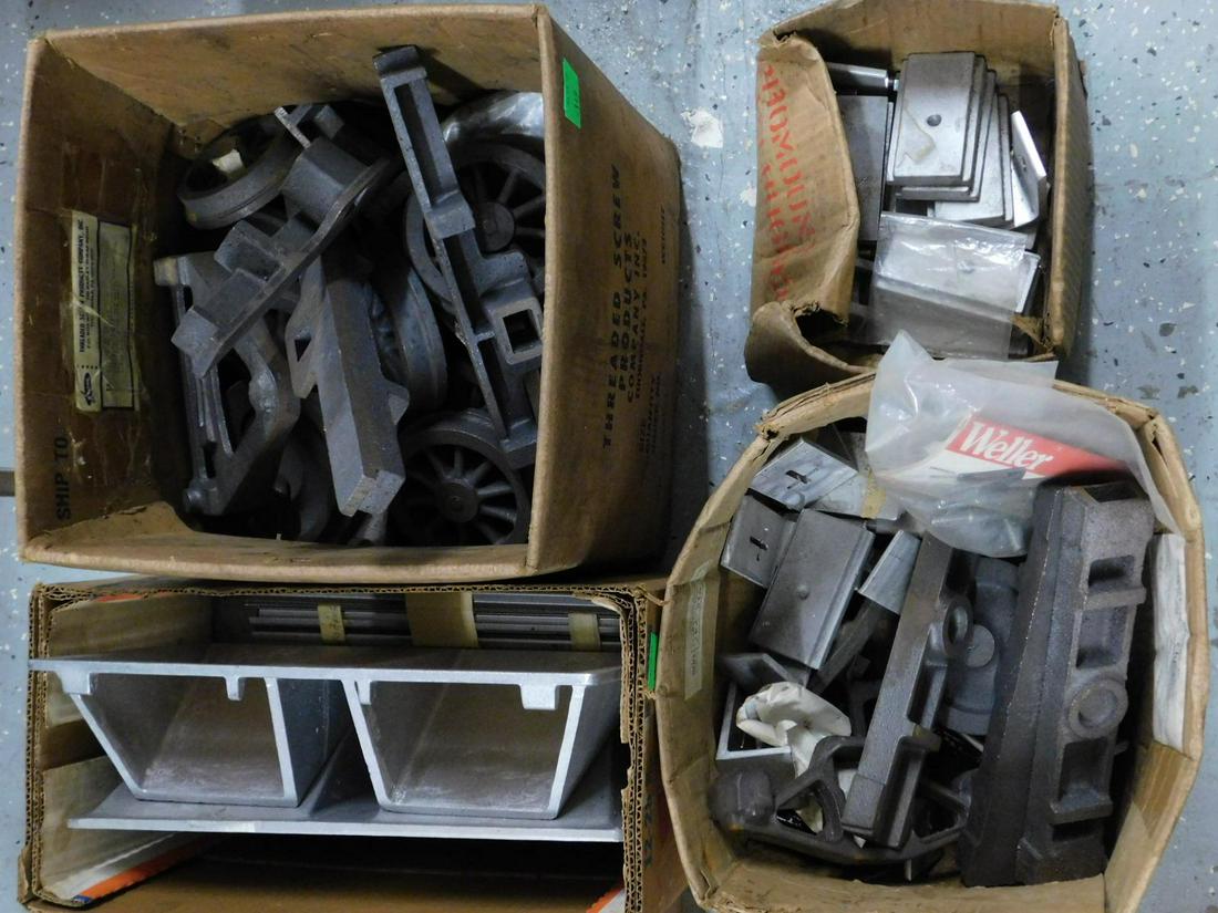 Live Steam Locomotive Parts Lot: Eight boxes of assorted live steam model locomotive castings and parts in 1/2" 3/4" and 1 1/2" scales; mostly iron, but includes a pair of 20th c delta trailing truck bronze castings. NOTE: THIS LOT I