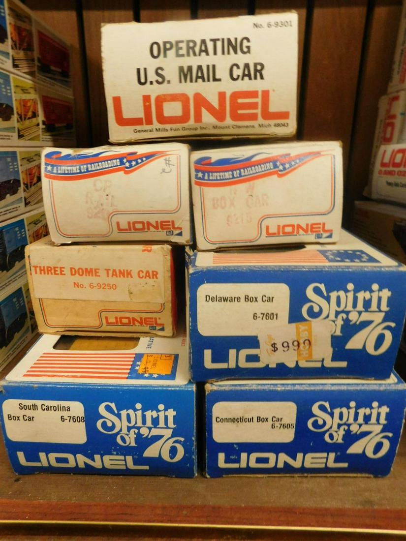 Assorted Lionel Train Cars: Assorted Lionel Train Cars, all in original boxes including: A Lifetime of Railroading - CP Rail Boxcar, No. 9208, Norfolk & Western Boxcar, No. 9215 and General Mills, three dome tank car, No. 6-9250