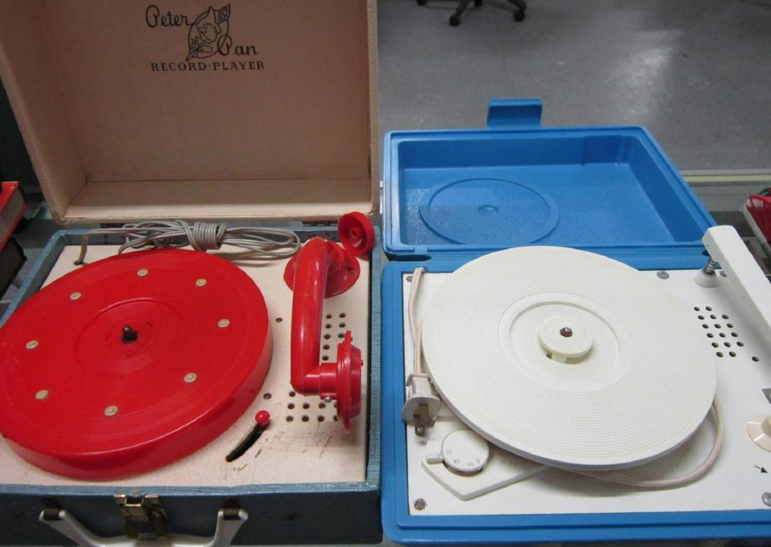 Vintage Peter Pan & Other Portable Record Player: including: vintage Peter Pan portable record player, blue case with white hinged lid, textured vinyl with white interior, red turn table with insert for 45 rpm records, 45 / 33.3 rpm switch at right,