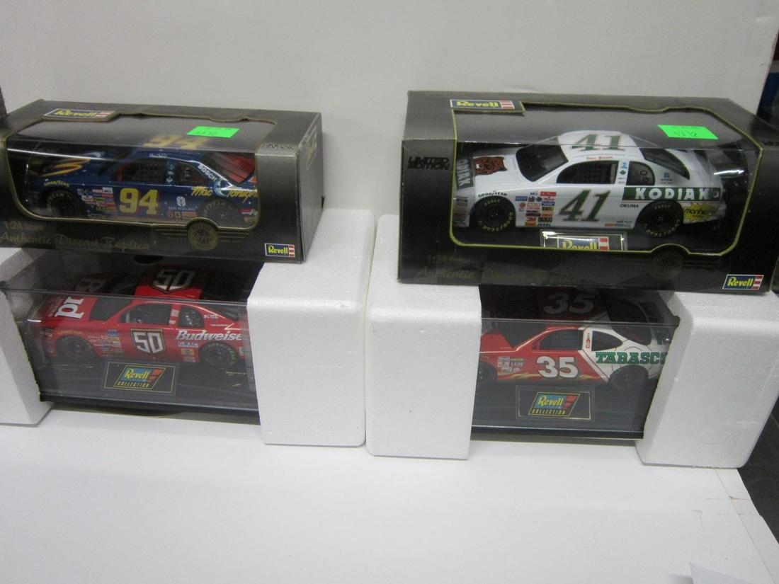 4 Revell Die Cast Race Cars: Four Revell Die Cast Race Cars, all 1:24 scale model in original boxes, all limited edition including: #94 (Bill Elliot) item #4442 ( 1 of 5004), #41 (Ricky Caraven), item #4414 (1of 5004), plus #35 (